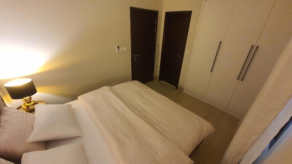 Postel nebo postele na pokoji v ubytování Jozefina Riviera Hawana Salalah