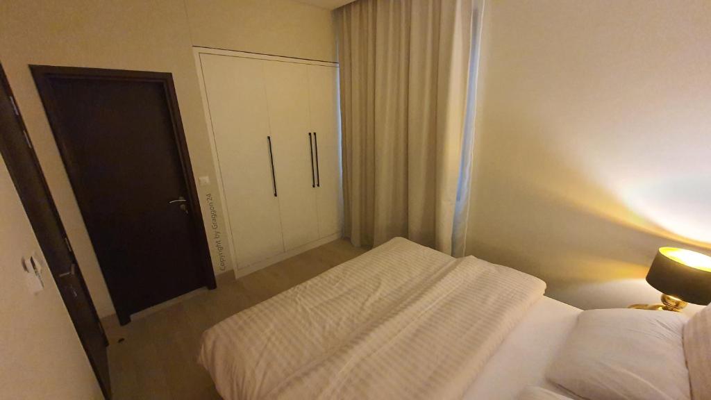 Postel nebo postele na pokoji v ubytování Jozefina Riviera Hawana Salalah