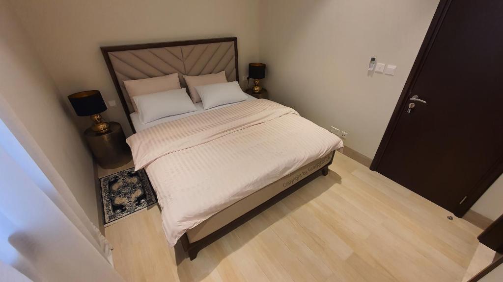 Postel nebo postele na pokoji v ubytování Jozefina Riviera Hawana Salalah