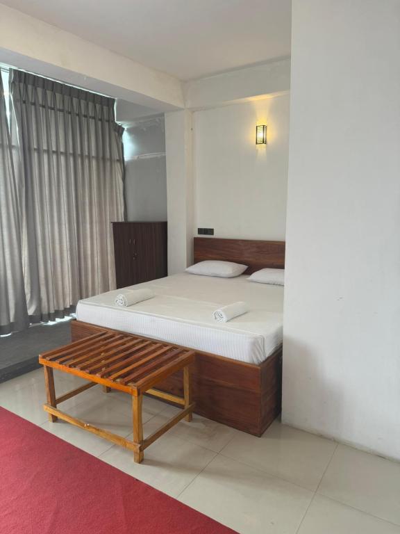 Postel nebo postele na pokoji v ubytování Sky Heaven Hotel