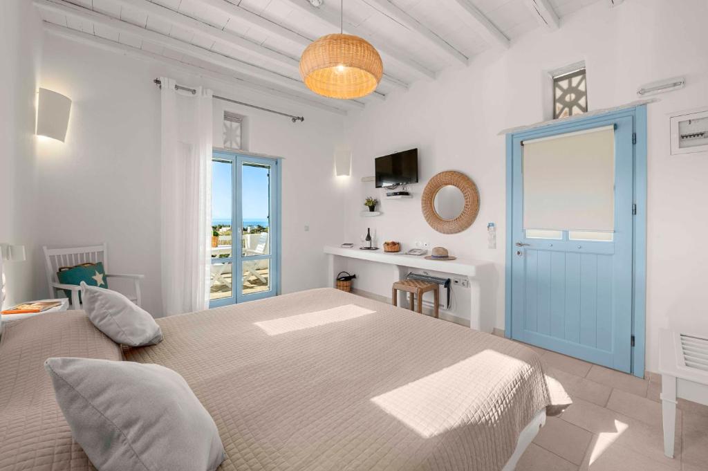 Postel nebo postele na pokoji v ubytování Anthea Hotel
