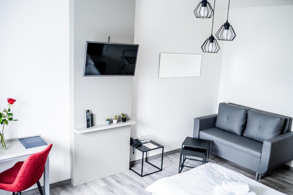 TV a/nebo společenská místnost v ubytování Hotel Gong