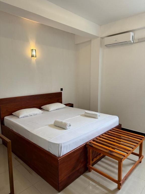 Postel nebo postele na pokoji v ubytování Sky Heaven Hotel