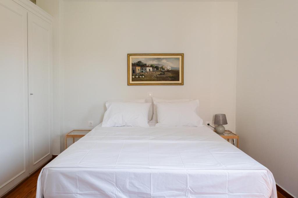 Postel nebo postele na pokoji v ubytování Beachfront Oasis