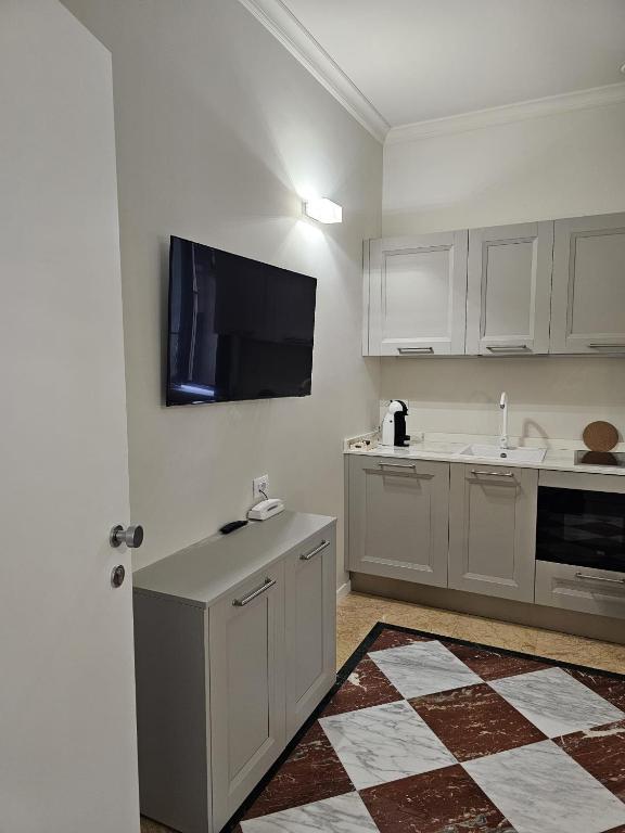 Kuchyň nebo kuchyňský kout v ubytování Andreola Central Hotel