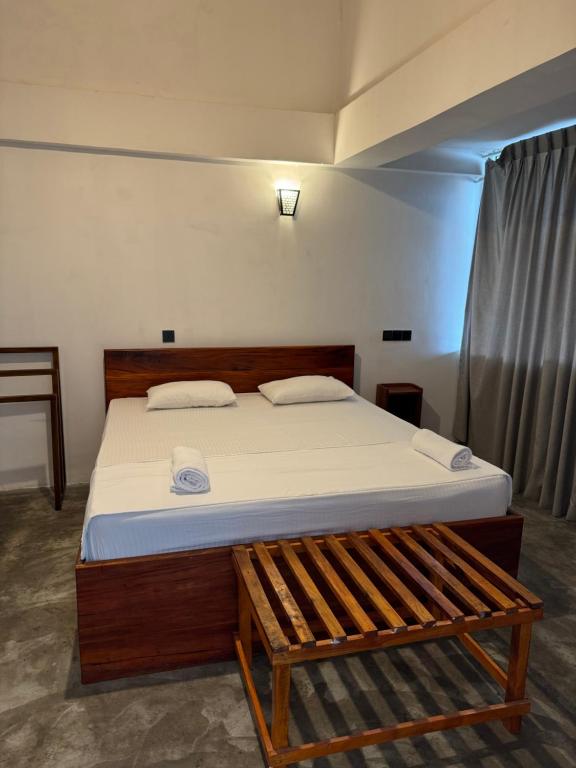 Postel nebo postele na pokoji v ubytování Sky Heaven Hotel