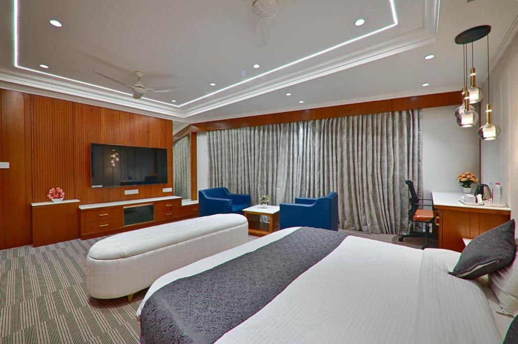 Postel nebo postele na pokoji v ubytování HOTEL SHITAL INN