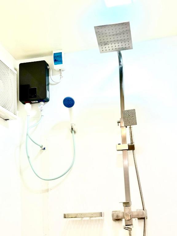 TV a/nebo společenská místnost v ubytování Mayad El Nido Hostel