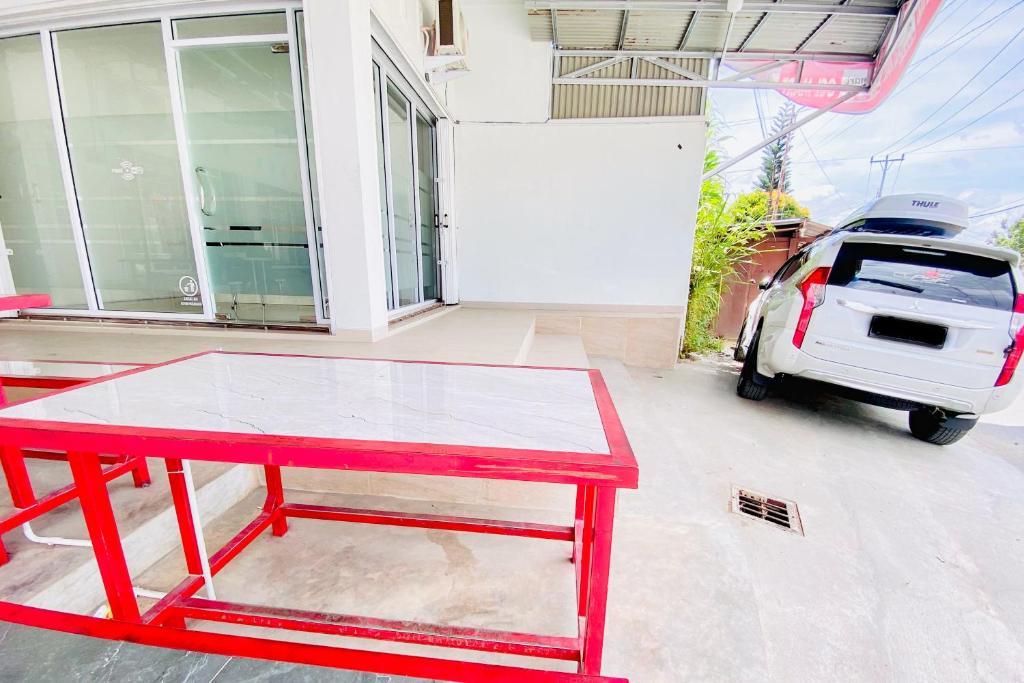 Fotografie z fotogalerie ubytování RedDoorz Syariah at GCL Bukittinggi v destinaci Bukittinggi