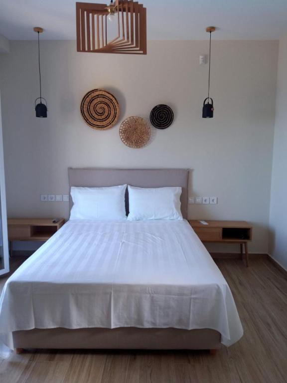 Posteľ alebo postele v izbe v ubytovaní Zephyros Villas - Agios Nikitas
