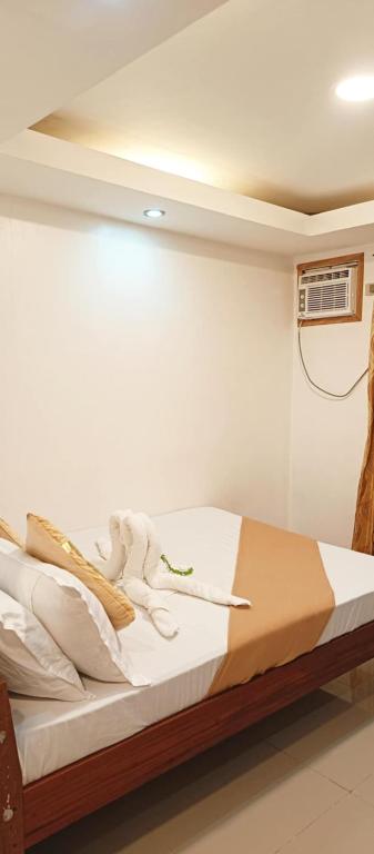 Postel nebo postele na pokoji v ubytování Mayad El Nido Hostel