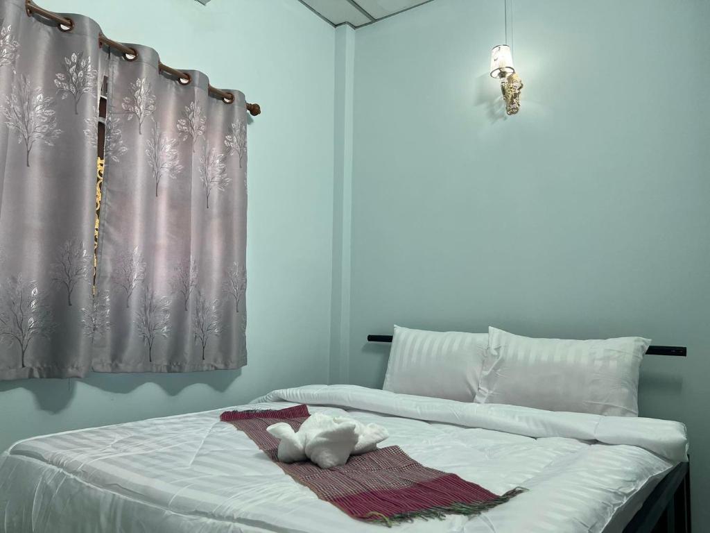 Postel nebo postele na pokoji v ubytování Lotus Blanc Homestay Villa