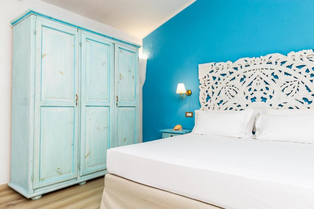 Postel nebo postele na pokoji v ubytování La Jacia Hotel & Resort