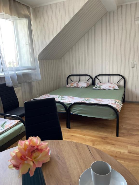 Postel nebo postele na pokoji v ubytování VIP hostel