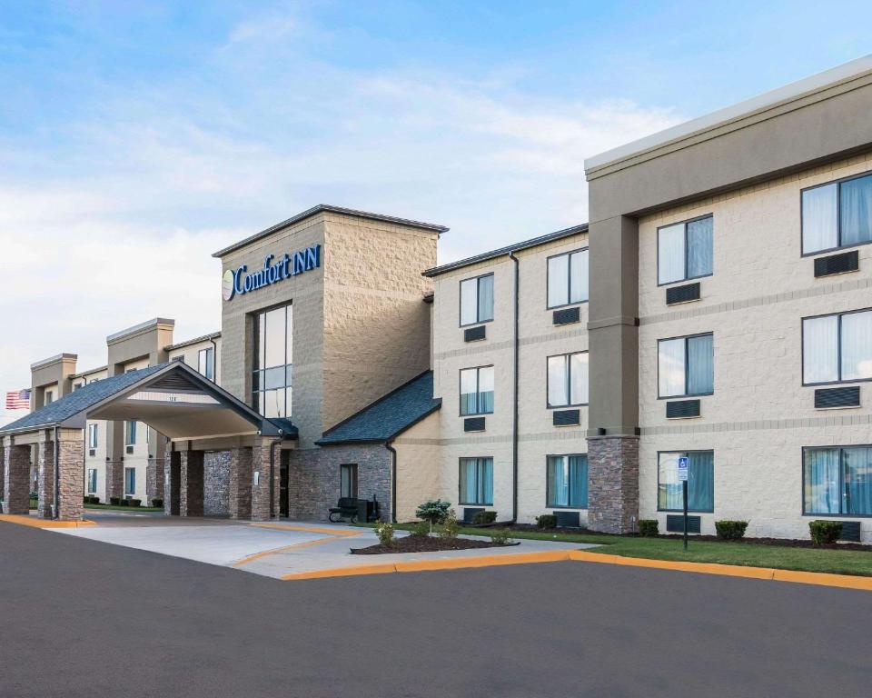 a rendering of the front of a hotel at Comfort Inn Metro Airport in Romulus