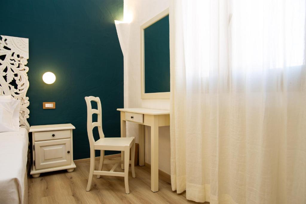 Postel nebo postele na pokoji v ubytování La Jacia Hotel & Resort