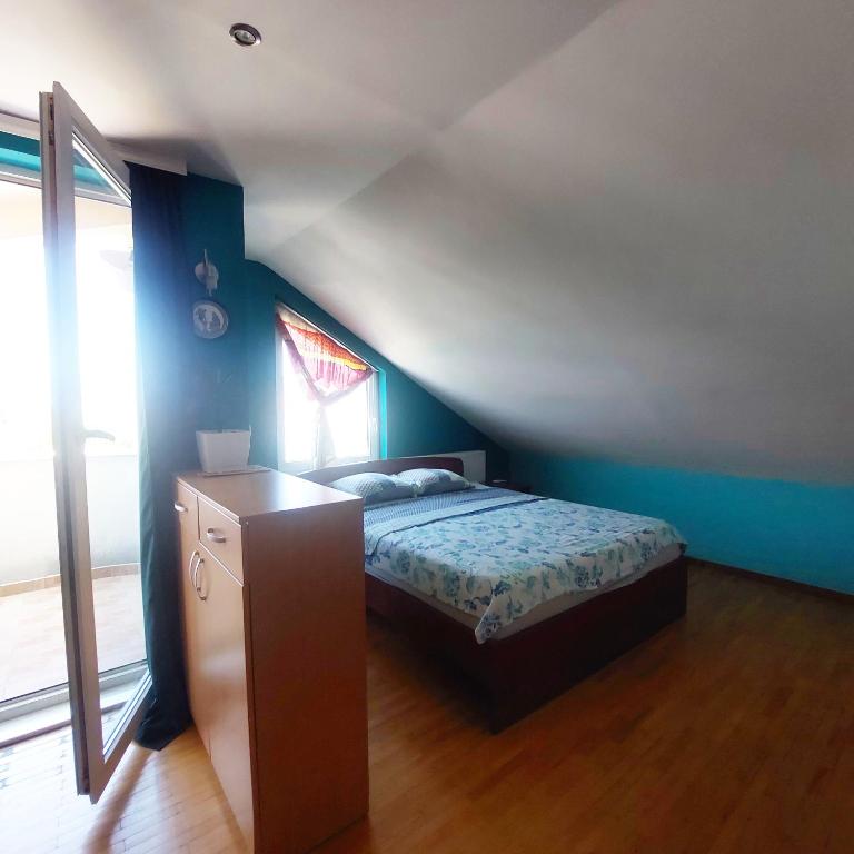 Postel nebo postele na pokoji v ubytování Golden Age Hostel