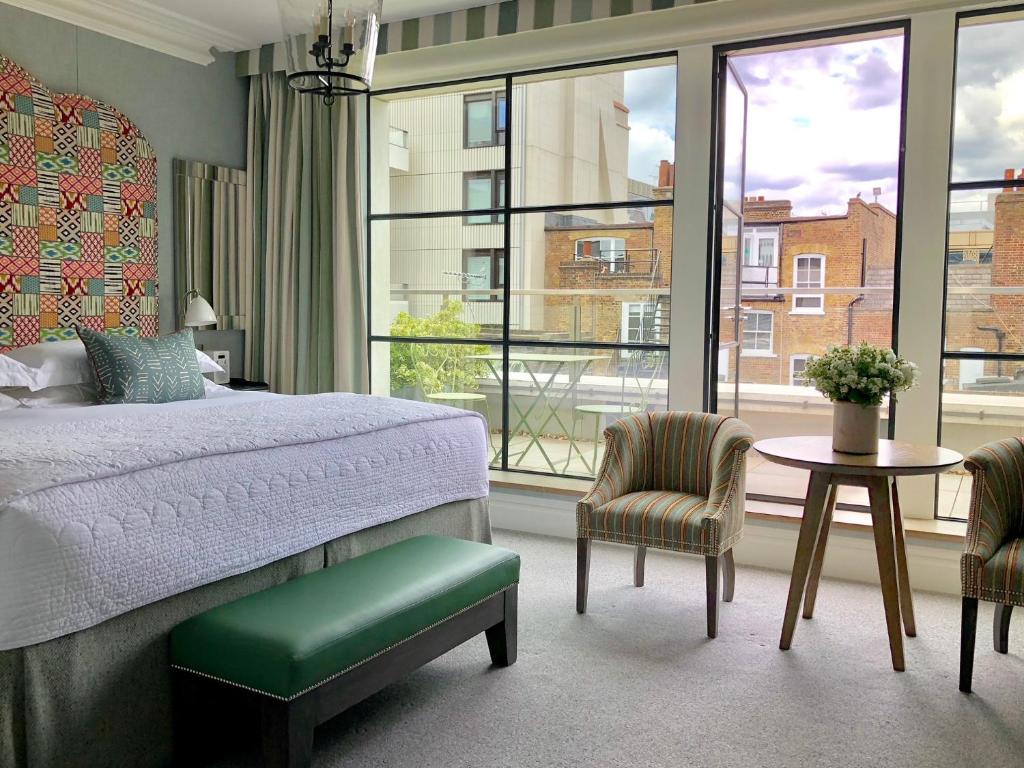 Postel nebo postele na pokoji v ubytování Ham Yard Hotel, Firmdale Hotels