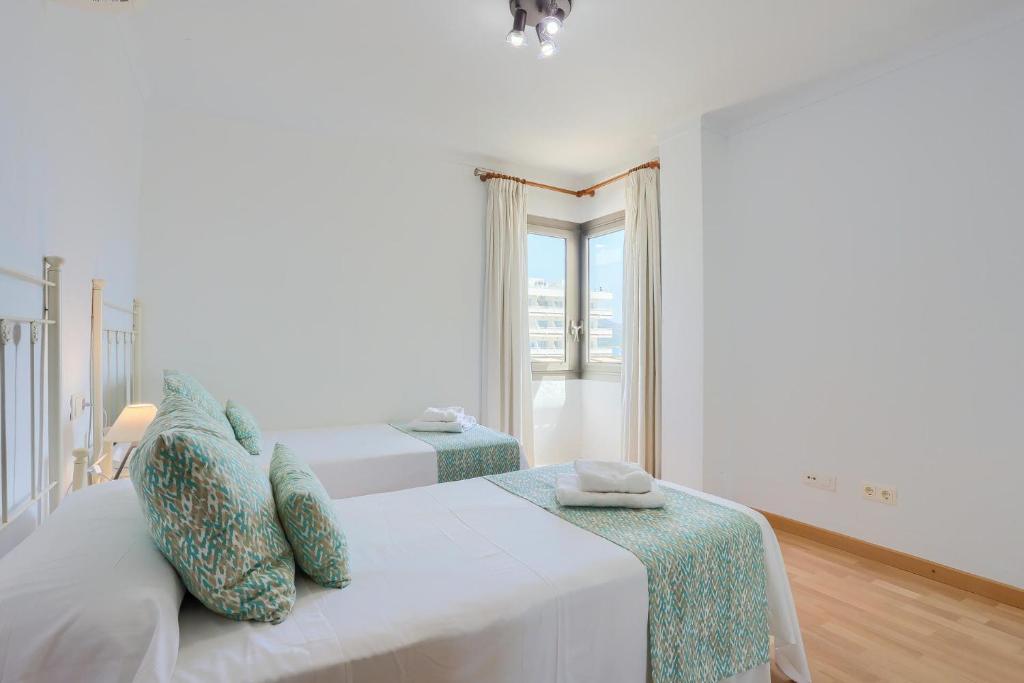 Posteľ alebo postele v izbe v ubytovaní Apartamento Rosa 16 by Rentallorca