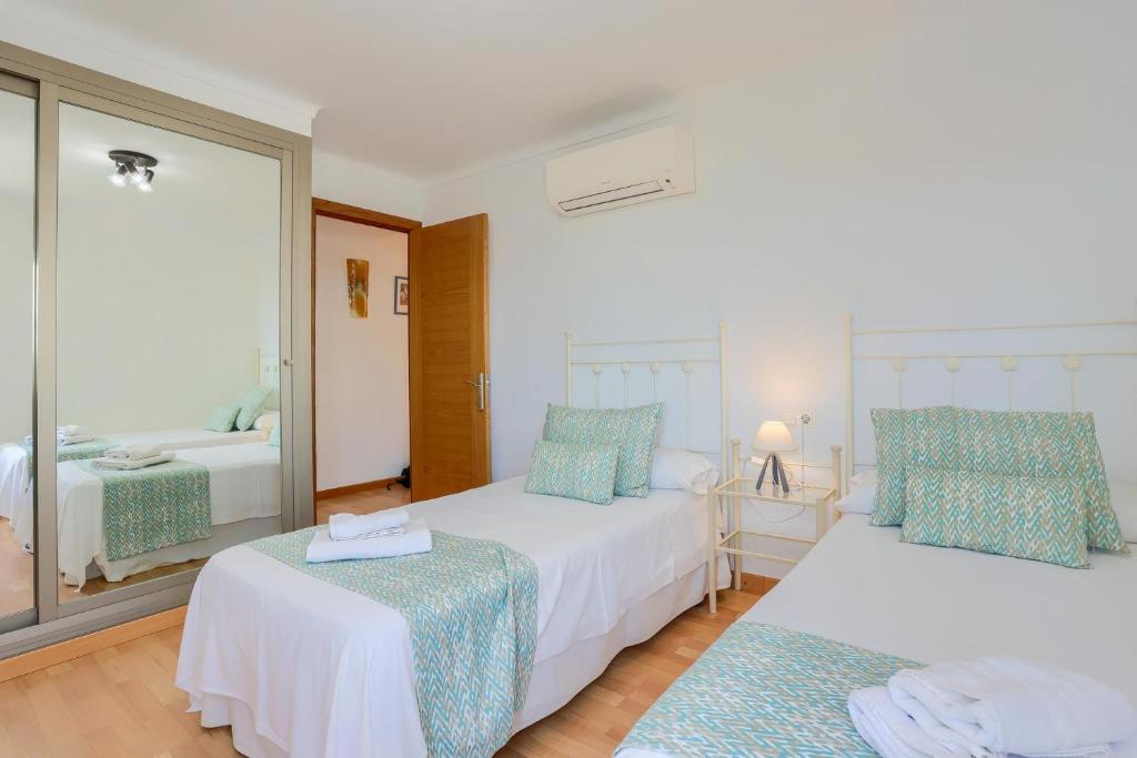 Posteľ alebo postele v izbe v ubytovaní Apartamento Rosa 16 by Rentallorca