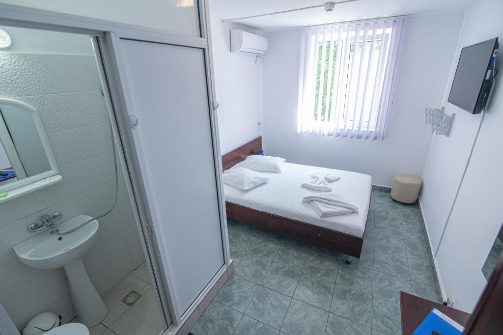 Koupelna v ubytování Hotel Proton