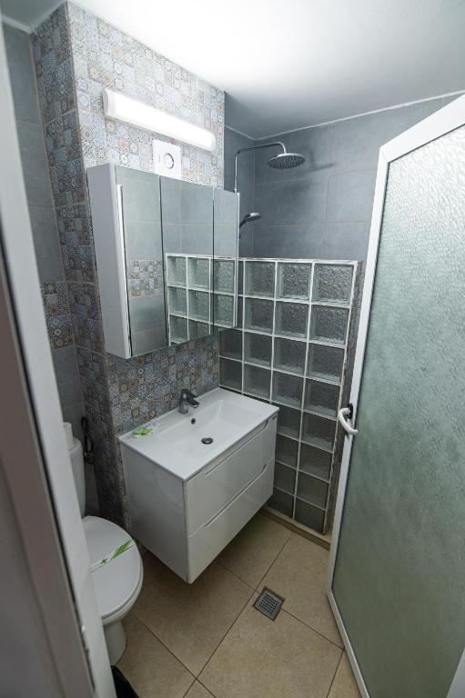 Koupelna v ubytování Hotel Proton