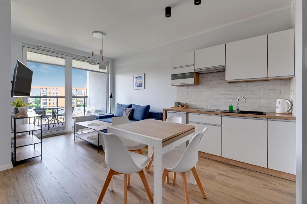 Kuchyňa alebo kuchynka v ubytovaní RentPlanet - Apartamenty Chlebova II