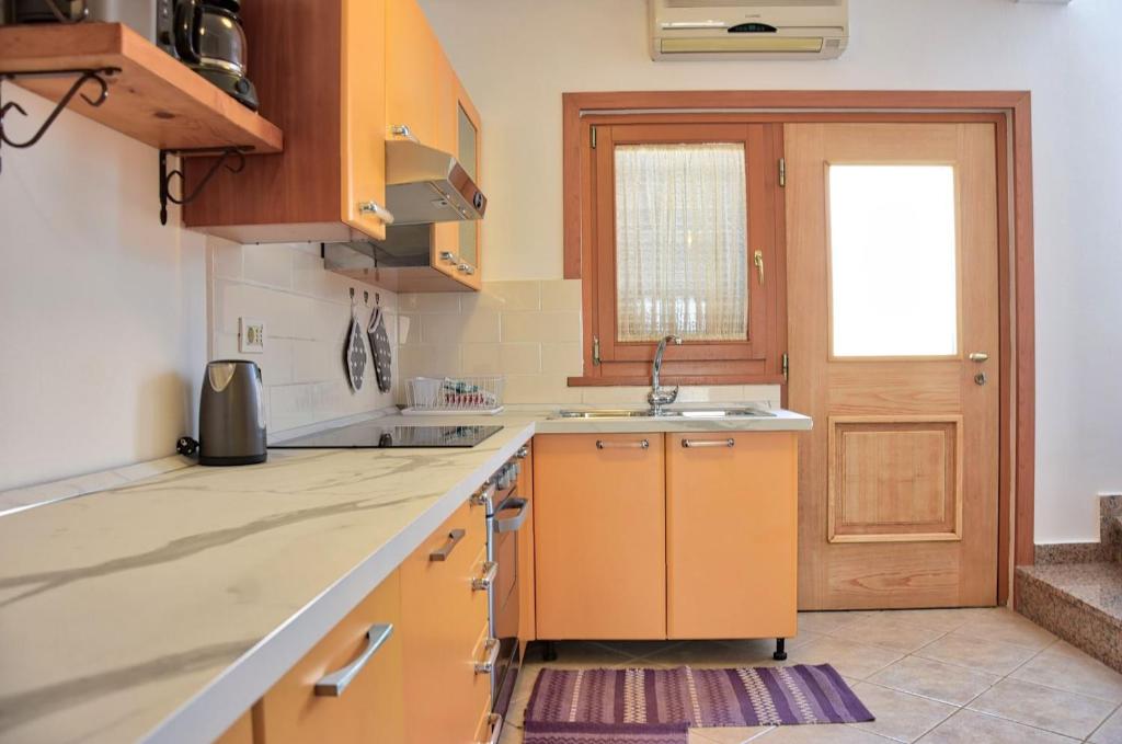 Kuchyň nebo kuchyňský kout v ubytování Vabriga Family Apartment with Pool