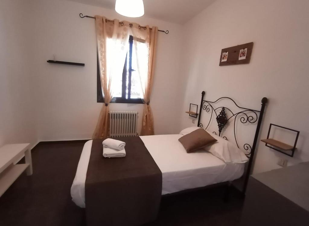 Postel nebo postele na pokoji v ubytování Palacio de Don Juan