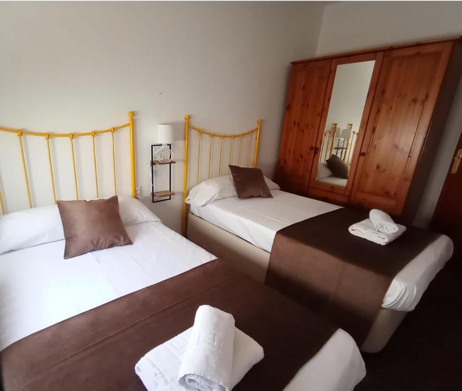Postel nebo postele na pokoji v ubytování Palacio de Don Juan