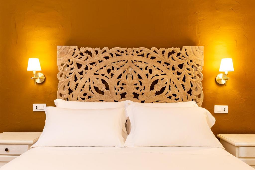 Postel nebo postele na pokoji v ubytování La Jacia Hotel & Resort