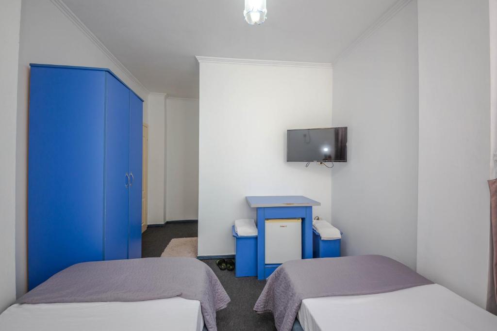 Postel nebo postele na pokoji v ubytování Hotel 3A