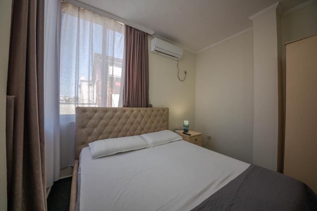 Postel nebo postele na pokoji v ubytování Hotel 3A