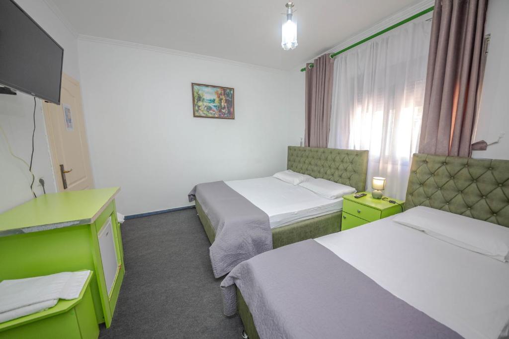 Postel nebo postele na pokoji v ubytování Hotel 3A