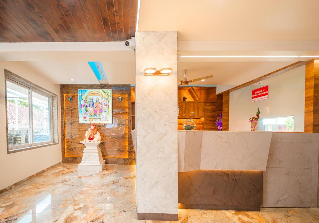 Vstupní hala nebo recepce v ubytování Treebo Sai Rekha Inn