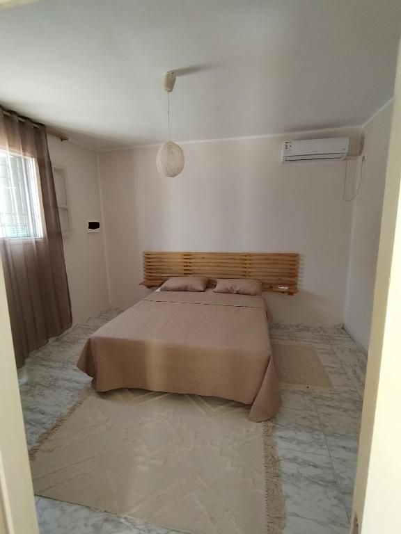 Postel nebo postele na pokoji v ubytování Appartement T2 60m2 Djerba Houmet Essouk
