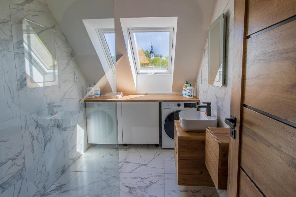 Kuchyň nebo kuchyňský kout v ubytování Podkrovní apartmán Karlovice
