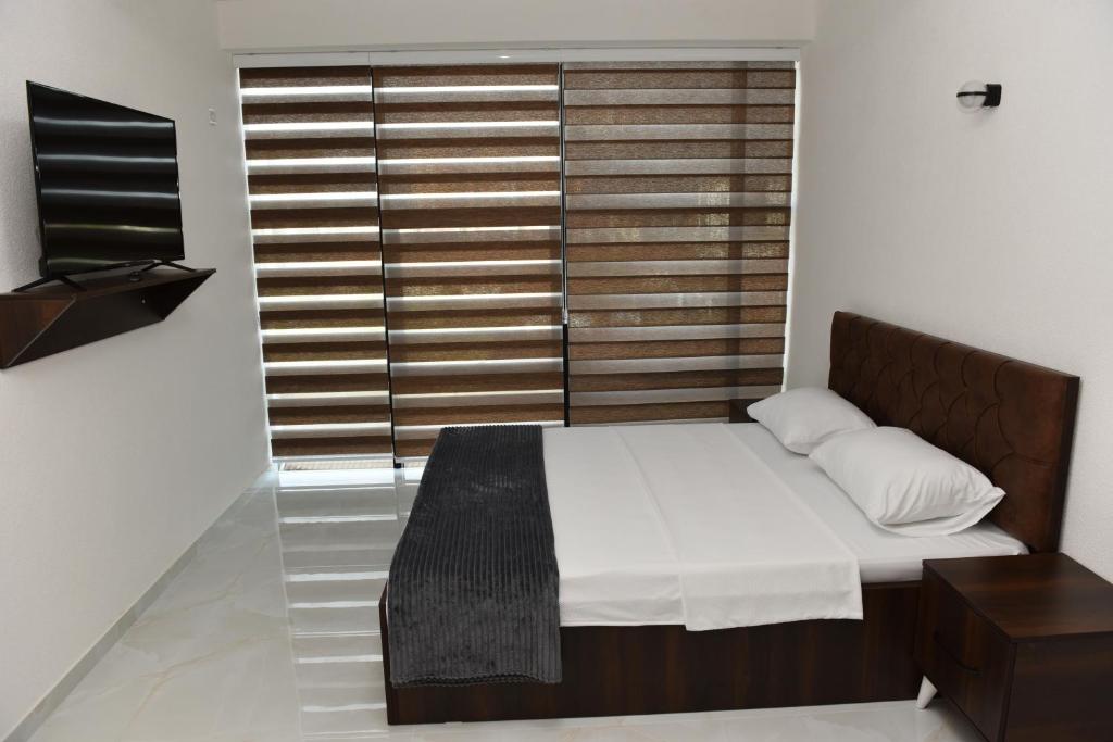 Postel nebo postele na pokoji v ubytování Hostel Jusaj Glob
