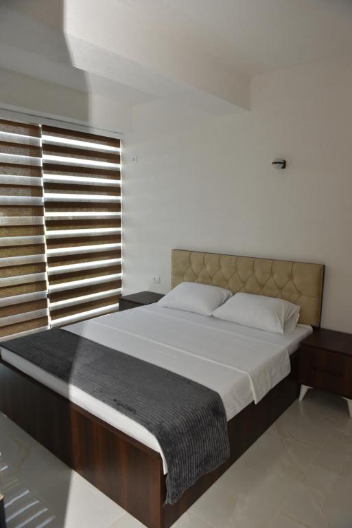 Postel nebo postele na pokoji v ubytování Hostel Jusaj Glob