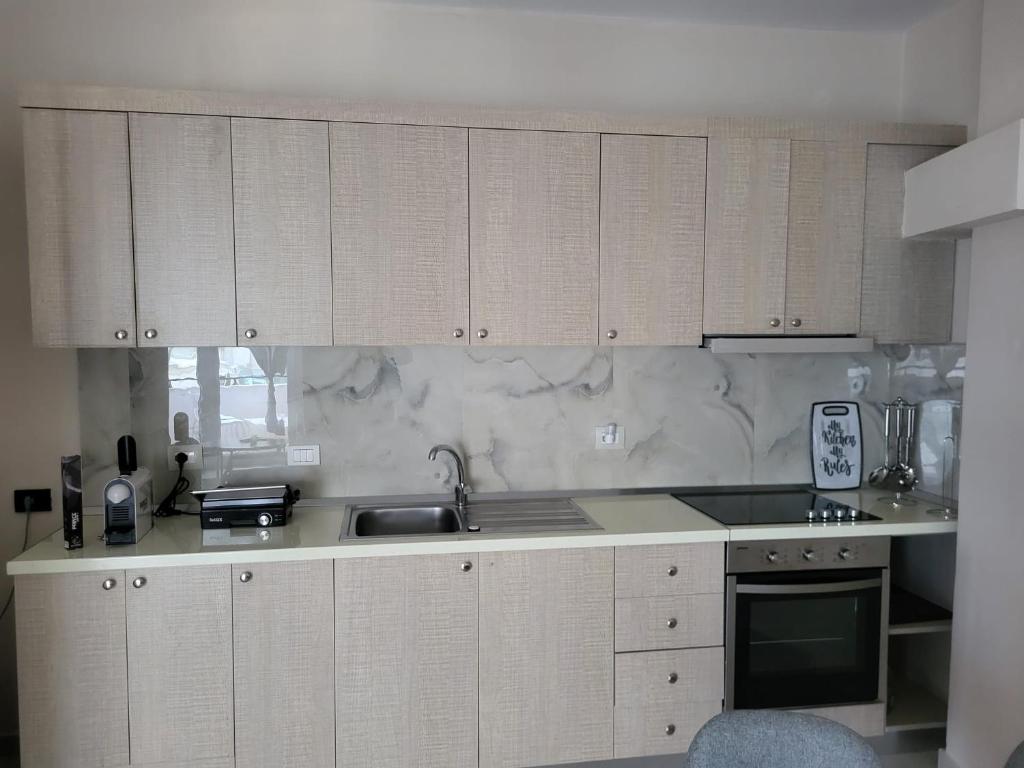 Kuchyň nebo kuchyňský kout v ubytování Aron Home