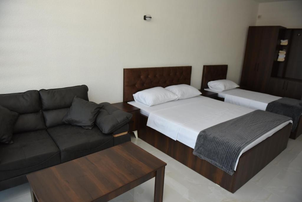 Postel nebo postele na pokoji v ubytování Hostel Jusaj Glob