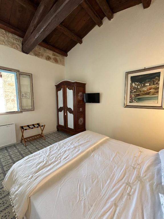Postel nebo postele na pokoji v ubytování Farfalla Blu