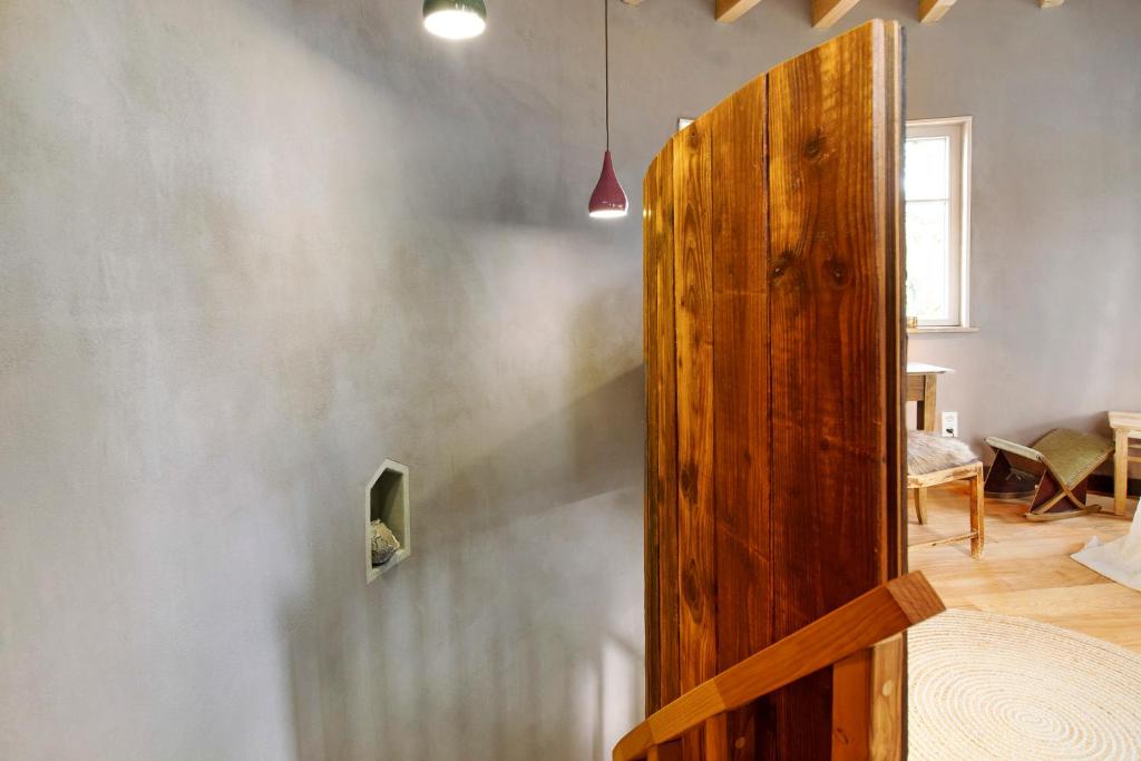 Postel nebo postele na pokoji v ubytování Uptrulli-Minihaus