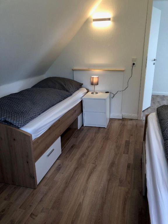 Postel nebo postele na pokoji v ubytování Ferienhaus-Sonnenwinkel