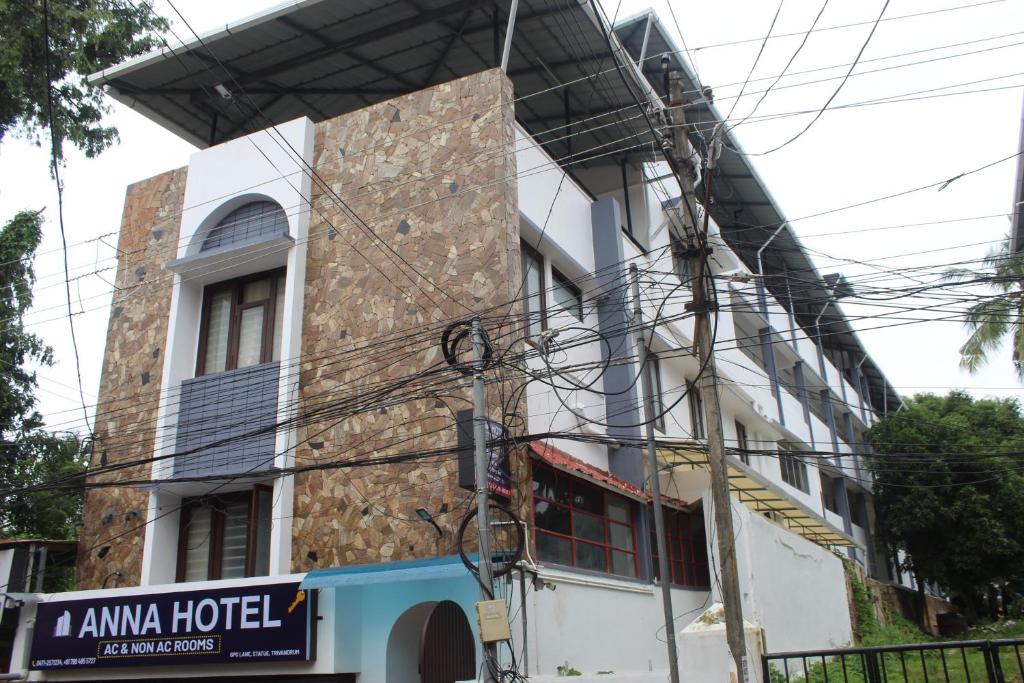 a building with a lot of wires at Anna Hotel in Trivandrum