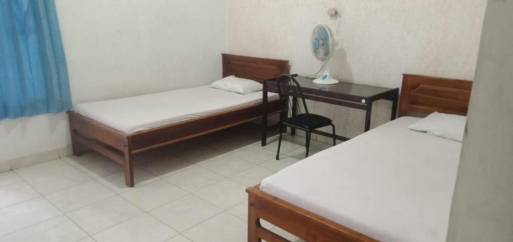 Hotel Singasari - Economy Tweepersoonskamer Met 2 Aparte Bedden