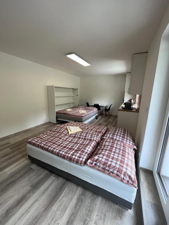 Postel nebo postele na pokoji v ubytování Apartmány Pohoda a Klid