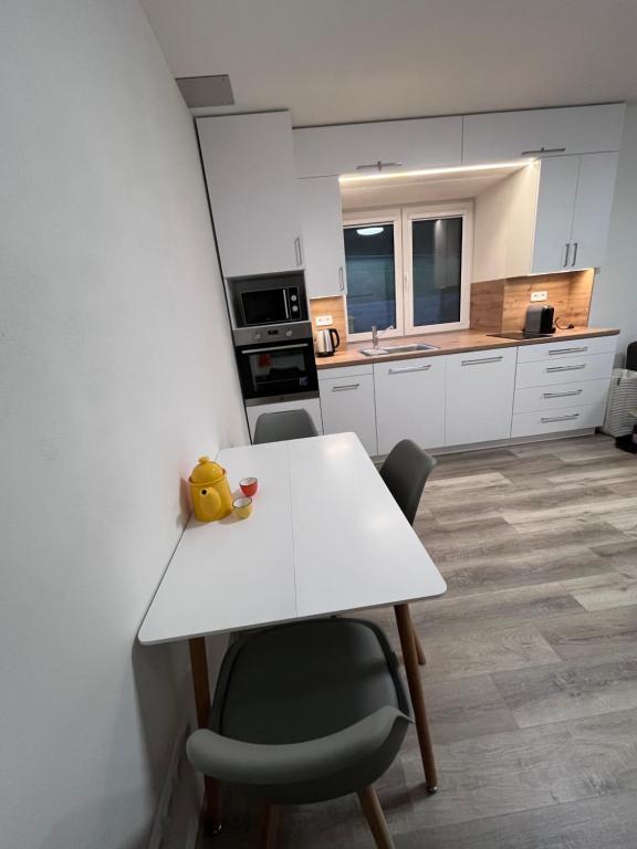 Kuchyň nebo kuchyňský kout v ubytování Apartmány Pohoda a Klid