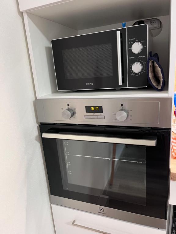 Kuchyň nebo kuchyňský kout v ubytování Apartmány Pohoda a Klid