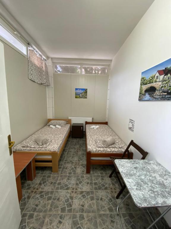 Postel nebo postele na pokoji v ubytování Rooms Asceric